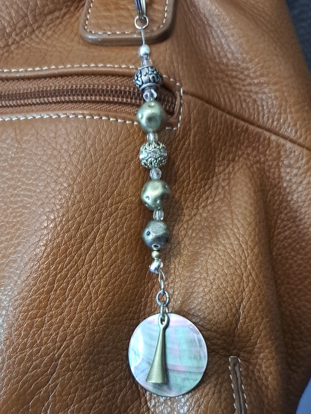 Hand Crafted Brown Shoulder Bag with Beaded Shell Charm